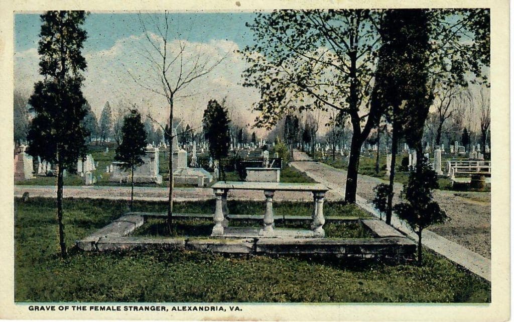 Female Stranger’s grave in Alexandria shown on a circa 1920 vintage postcard, highlighting the most visited grave in St. Paul’s Cemetery.