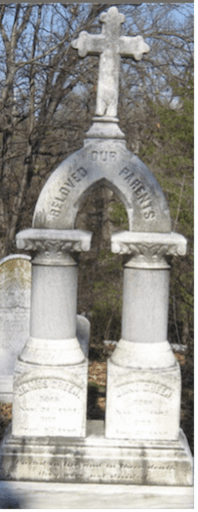 Gravestone of James Green in Ivy Hill Cemetery, featuring a unique arch with a cross. His wife, Jane Muir Green (1803–1880), is buried beside him. The inscription reads, 'United in life and in their death they were not divided."