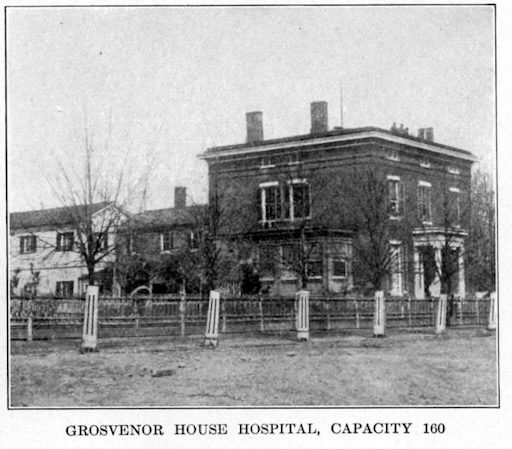 Civil War-era photograph of Grosvenor House Hospital at 414 North Washington Street in Alexandria, Virginia, showing the original Greek Revival home with an added two-story hospital wing.