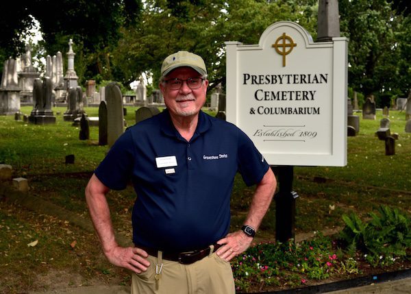 David Heiby, public historian and cemetery steward, standing in the Presbyterian Cemetery before leading a Gravestone Stories tour in Alexandria, Virginia.