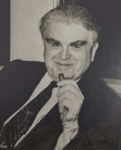 Black and white portrait photograph of John L. Lewis in a business suit, showing the United Mine Workers president who received the Presidential Medal of Freedom in 1964 while living in Alexandria's Lee-Fendall House.