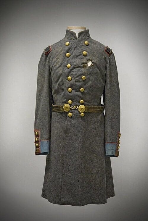 Gray military coat worn by Colonel Elmer E. Ellsworth when he was killed at the Marshall House in Alexandria on May 24, 1861, showing a bullet hole in the chest where James W. Jackson’s shot struck him.