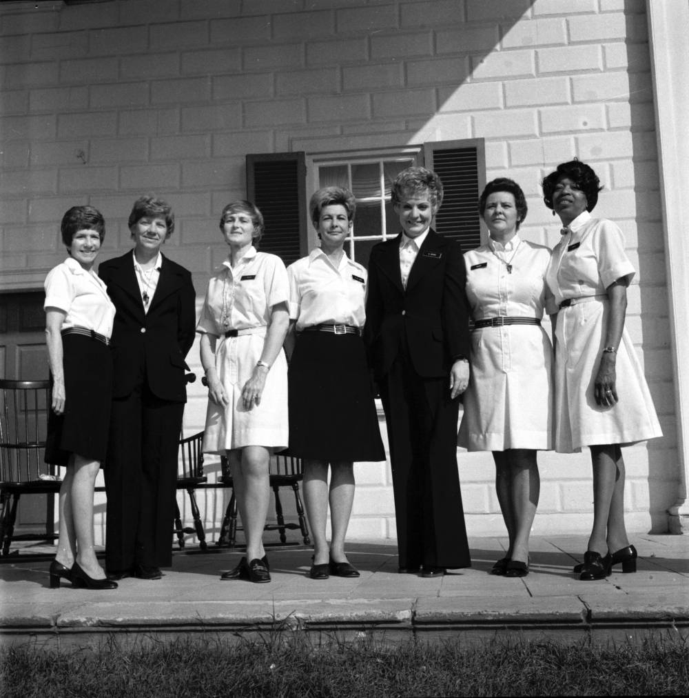 Gladys Quander Tancil stands with fellow Mount Vernon docents, all dressed in docent attire, during a group portrait at George Washington’s Mount Vernon.